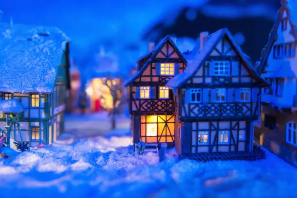 Photo of miniature houses in village at winter