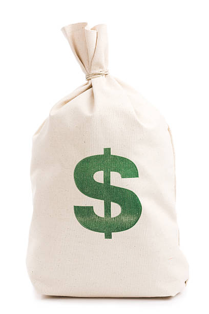 Beige money bag with green dollar sign against white Money bag on a white background. money bag stock pictures, royalty-free photos & images