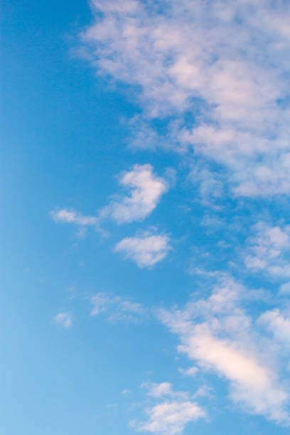istock beautiful clouds in the sky at sunset background 921938698
