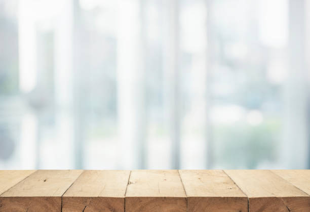 istock Wood table top on white abstract background form department store. 921945536