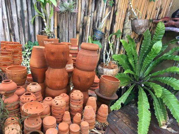 istock Decorative flower pots and vases stacking at garden shop. 921958208