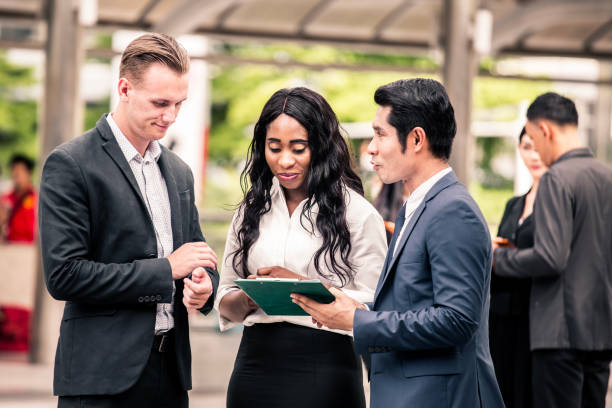 istock Black Woman Work about Business Project with team together. People talking for business project with team. Business people  working concept. vintage tone. 921966286