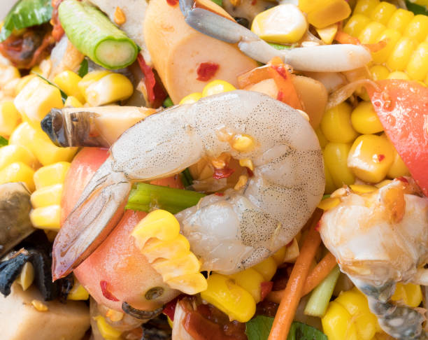 Spicy papaya corn salad with shrimp and fresh crab, Papaya corn salad is the most popular of women in Thailand