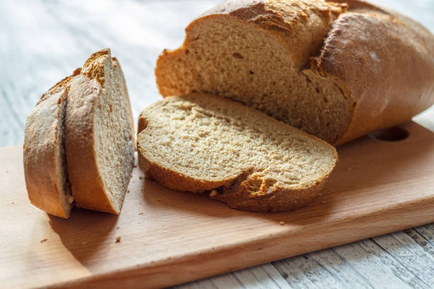 istock On a wooden background rye bread sliced close-up. 921977480