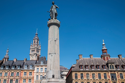 View in Grand Place in the historical city of Lille, France. The view includes the Column of the Goddess, Vieille Bourse, and the chamber of Commerce and Industry.