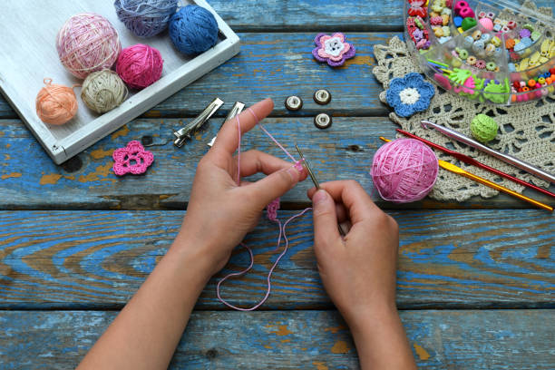 istock Needlework accessories for creating crocheted jewelry. Step 1 - crochet strap for bracelet or chain. DIY project. Small business. Income from hobby 921988310