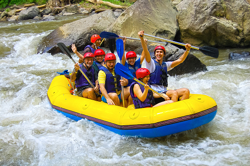 Bali, Indonesia - April 11, 2012: Rafting in the canyon on Balis mountain river Ayung at Bali, Indonesia on April 11, 2012