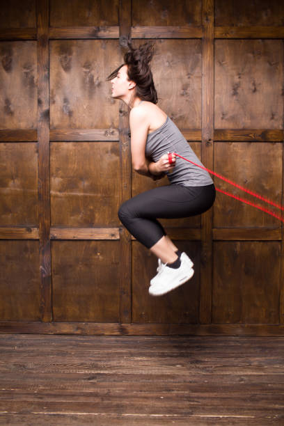 istock Girl jumping on skipping rope 921996250