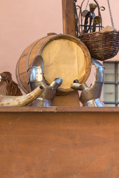 istock Oak Barrel on Wooden Table with Hand Iron Armors 922000506