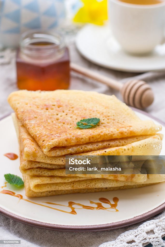 Stack of thin pancakes crepes with caramel topping Stack of thin pancakes crepes with caramel toffee topping Crêpe - Pancake Stock Photo