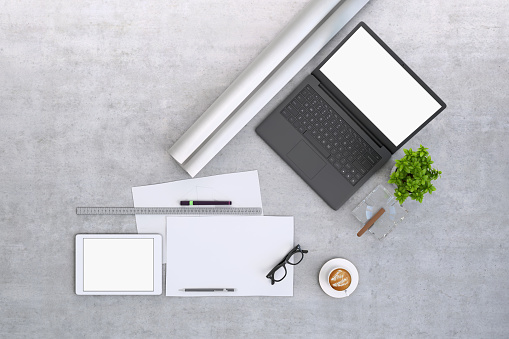 Top view, knolling concept of a business office desk, with laptop, paper, plant, and accessories. background copy space mock up for designers. blank screen. render