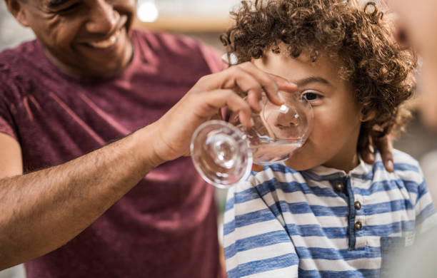 istock Here son, take a sip of water! 922006464