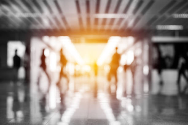istock abstract blurred people in walking street 922006910