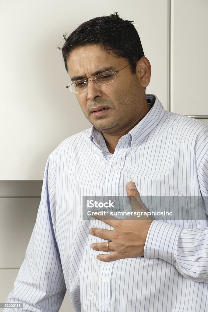 Heartburn pain  Heart Attack Stock Photo