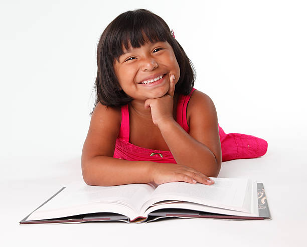 istock Little girl reading 92202213