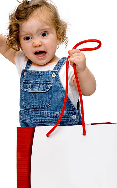 bébé fille dans un sac en papier isolé - beautiful red hair curly hair human hair photos et images de collection