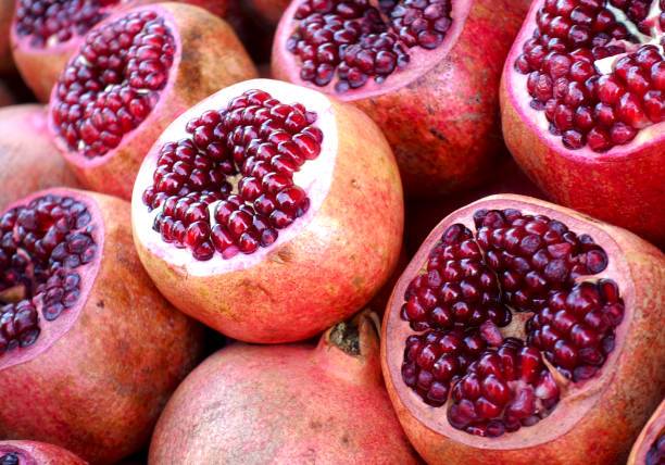 istock Red grains of cut pomegranate 922028464
