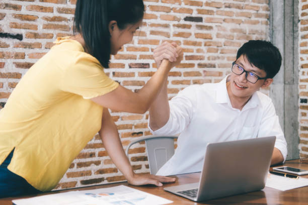 istock Man and woman working together. 922029924