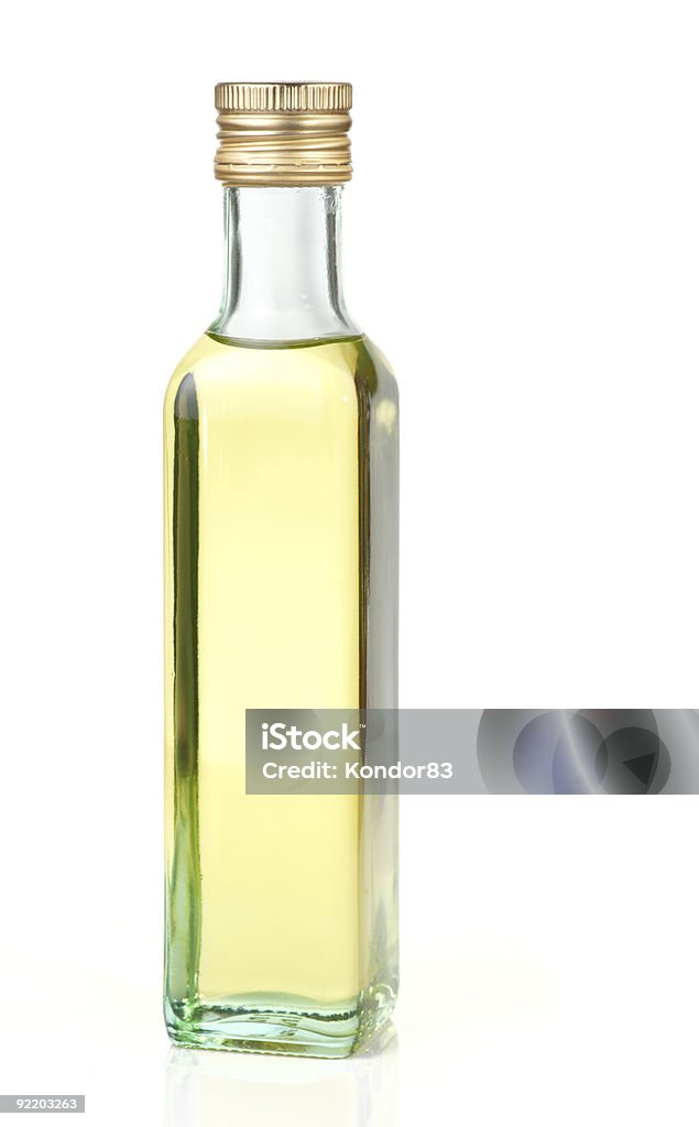 Grape seed oil in glass bottle, isolated  Antioxidant Stock Photo