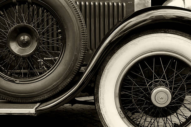 istock Antique car wheels sepia 92203339