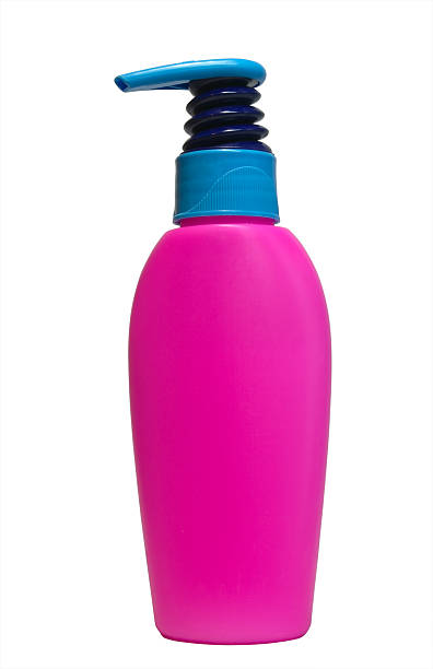 pink bottle with dispenser isolated stock photo