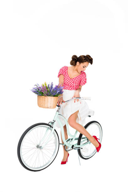 istock attractive pin up woman on retro bicycle isolated on white 922044922