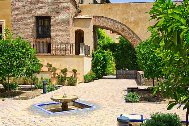 Garden in the Alcazar Palace  alcazares reales of sevilla stock pictures, royalty-free photos & images