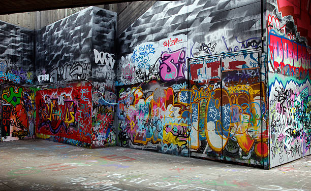 istock Gray walls painted with bright colorful graffiti 92204754