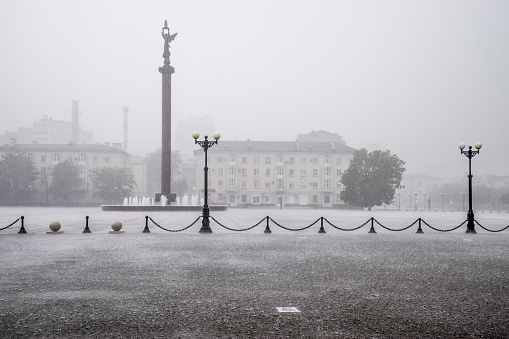A heavy rain on the embankment of Novorossiysk. Heavy rain.