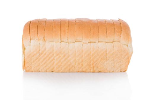 Sliced loaf of bread isolated on white background