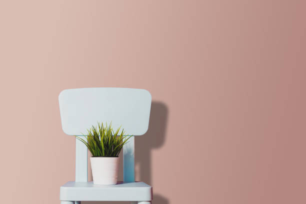 istock Blue pastel chair on a pastel background. 922063284