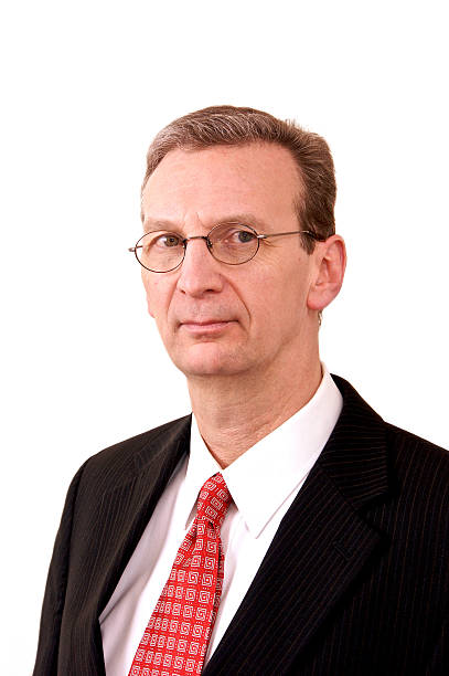 istock portrait of older stern looking executive man on in 92206500