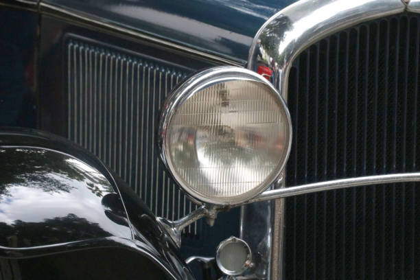 istock headlights of a classic car 922071464