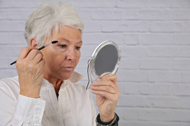 istock Senior Woman Uneven Eyebrows. Makeup for Older Women 922072322
