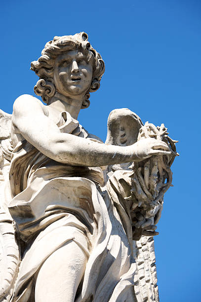 istock Sculpture of an angel under a pretty clear blue sky. 92207495