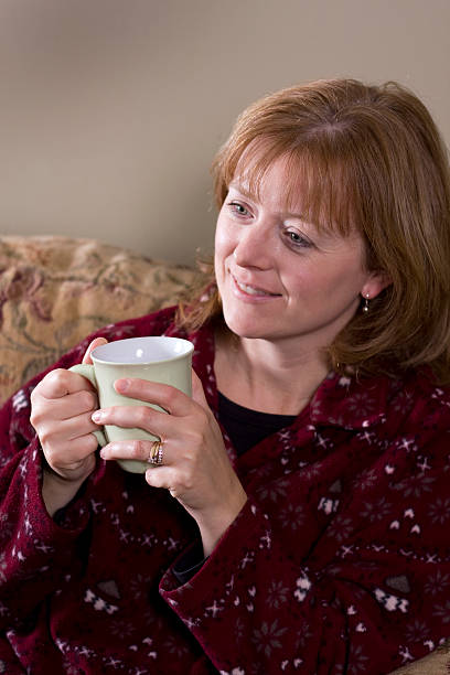 istock Beautiful woman enjoying coffee 92207591