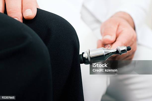 Closeup Of A Doctor Testing His Patients Reflexes Stock Photo - Download Image Now - Sensory Perception, Adult, Care