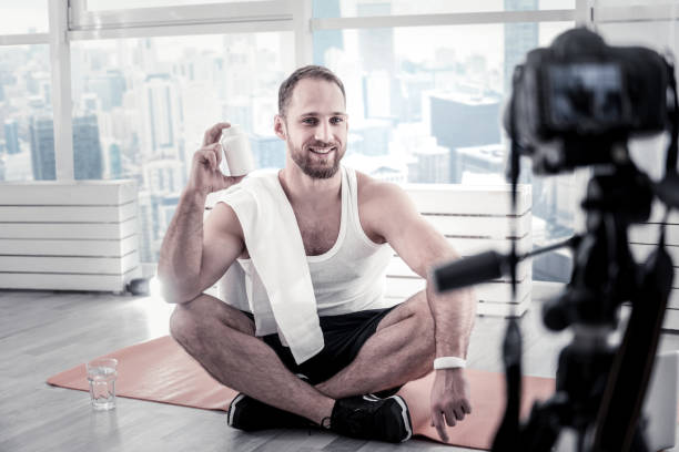 istock Joyful male blogger giving advice about proteins 922076666