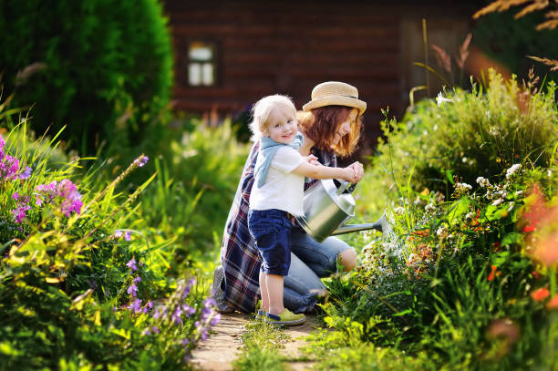 istock Cute toddler boy and his mat summer sunny day 922088872