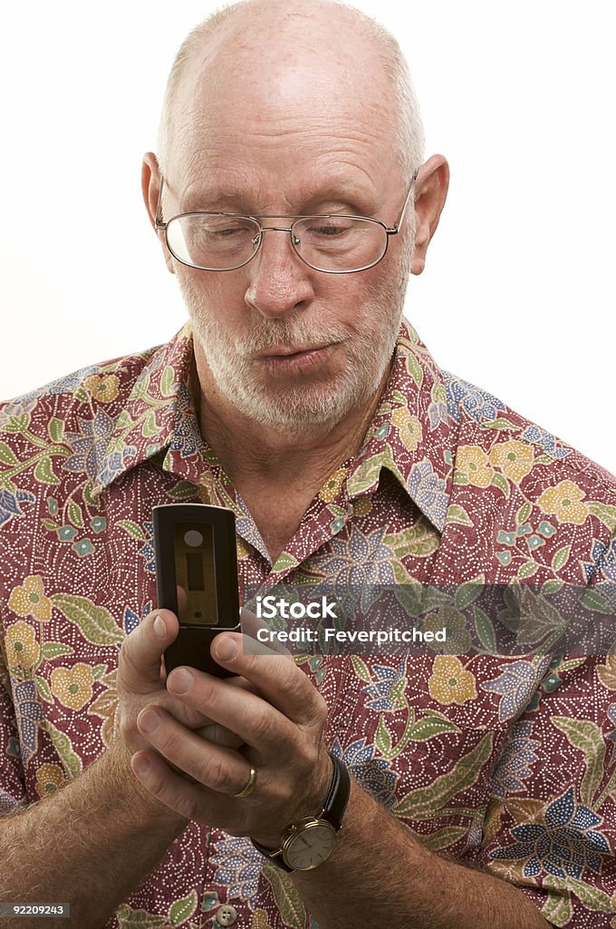 Senior Man and Cell Phone  Active Seniors Stock Photo
