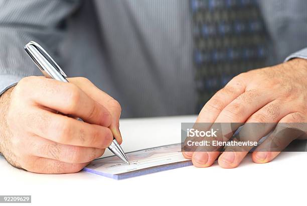 Writing A Check Stock Photo - Download Image Now - Adult, Business, Businessman