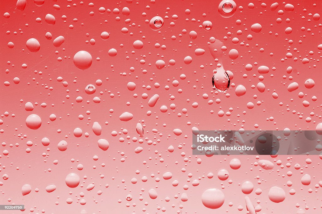 Rosso sfondo di gocce d'acqua - Foto stock royalty-free di Acqua