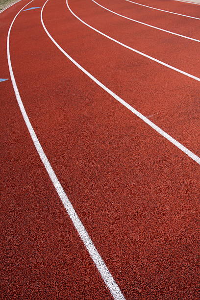 istock Curve of a red running track 92209917
