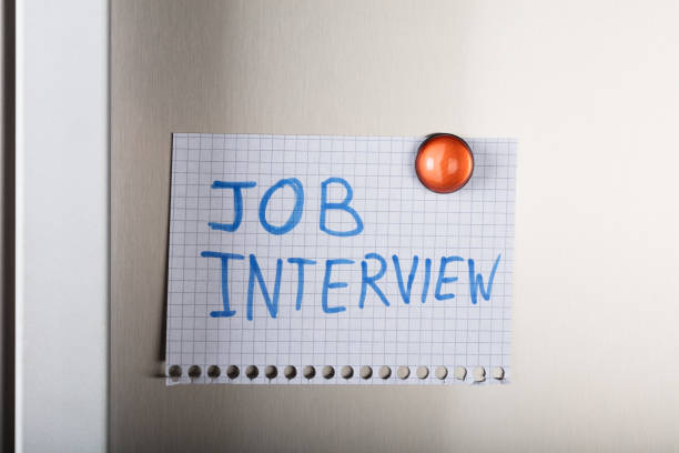 istock Job Interview Note Attached With Orange Magnetic Thumbtack 922103260