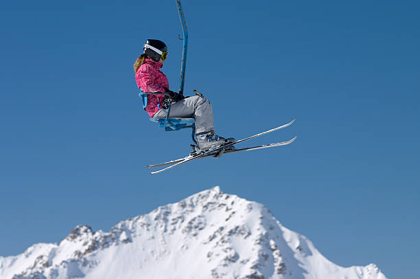 istock skier girl on ski lift 92210945