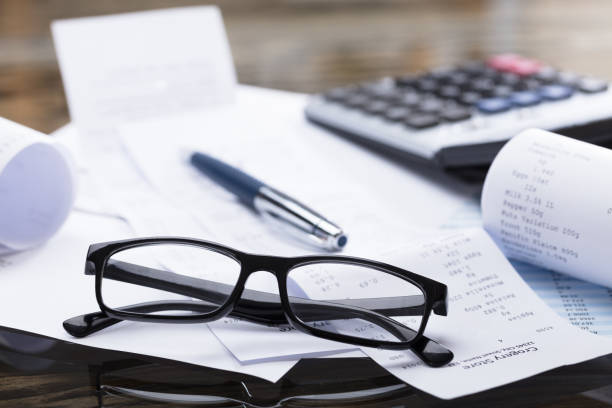 istock Eyeglasses And Pen On Receipt 922109636