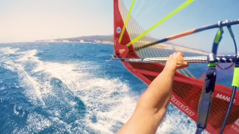 POV Windsurfing along the coastline