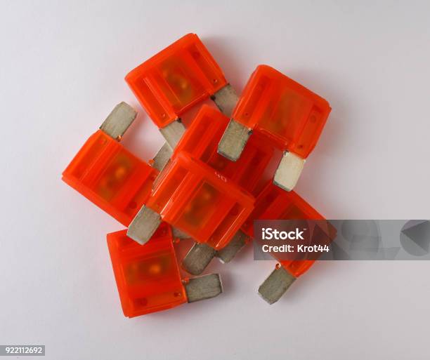 Orange Car Fuses On White Background Stock Photo - Download Image Now - Car, Close-up, Connection