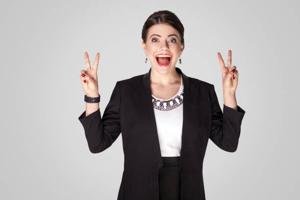 istock Happiness manager showing v sign, peace or four number 922113132
