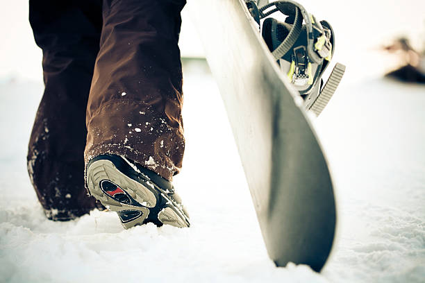 snowboarder. cross-processamento efeito - snowboard boot imagens e fotografias de stock